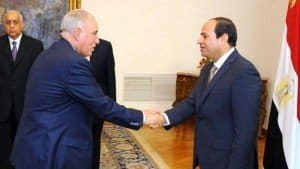 Mr Zind (left) was sworn in as justice minister by President Abdel Fattah al-Sisi in 2015