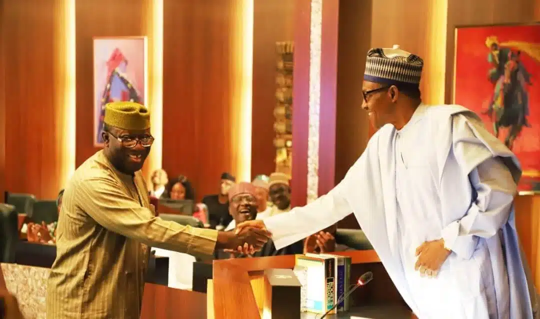 Muhammadu Buhari shaking Kayode Fayemi