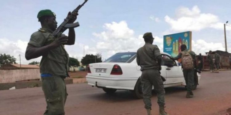 Soldiers patrolling on the Street of Mali