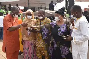 Dele Odule, the winner of Tricycle and his wife