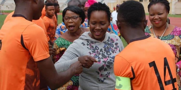 GM Ekiti State Sports Council, Mrs. Olusola Osetoba Inspecting teams before a match in the on-going ODEP Unity Cup.