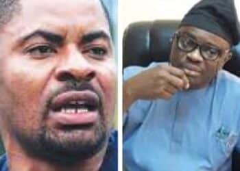 Deji Adeyanju with Taiwo Adisa