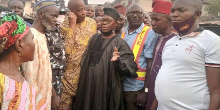 Senator Kola Balogun inspecting road construction