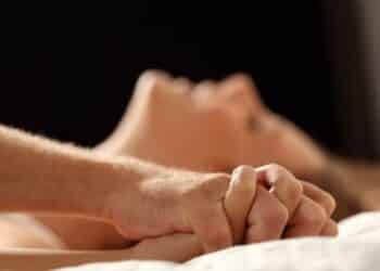 Couple Having Sex in Bed