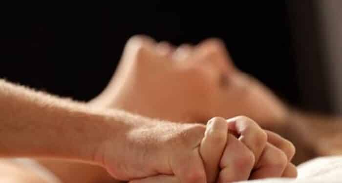 Couple Having Sex in Bed