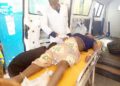 Mrs Laruba Peter, wife of the deceased guard being rushed to University of Abuja Teaching Hospital, Gwagwalada,