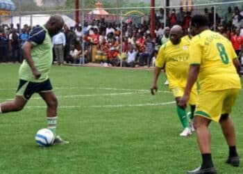 former nigerian president olusegun Obasanjo playing football