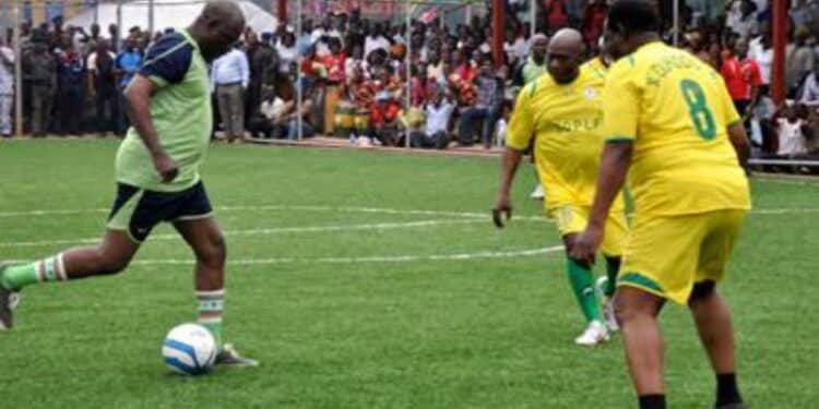 former nigerian president olusegun Obasanjo playing football