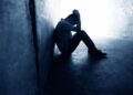 man depressed with low self-esteem