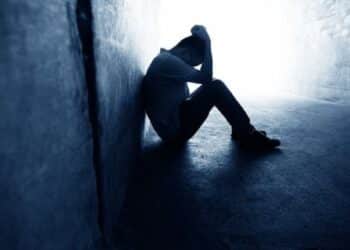 man depressed with low self-esteem