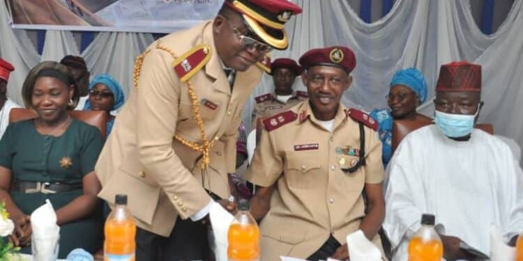 Samson Dairo welcoming representative of FRSC Boss