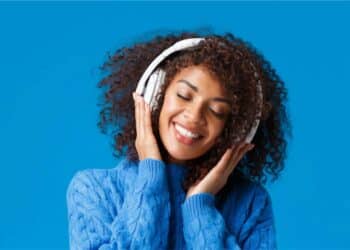 WOMAN LISTENING TO MUSIC