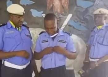 Police officer weeps