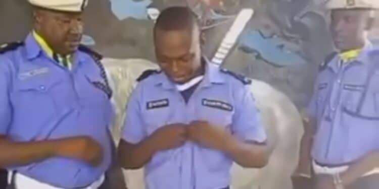 Police officer weeps
