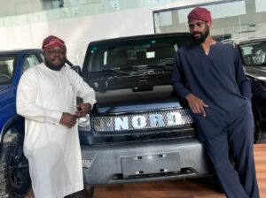 Nigerian chess master Tunde Onakoya with Nord Motors CEO Oluwatobi Ajayi