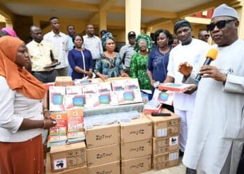 Makinde Distributes Tablets Teaching Materials