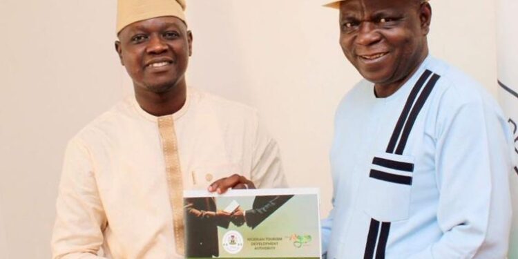 Ovie Esewhaye with NTDA DG Olayiwola Awakan