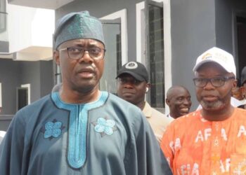 Abduljelyl Adekunle Karheem with Seyi Makinde