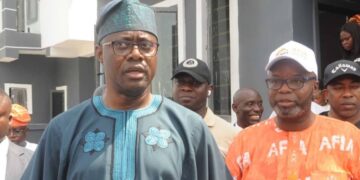 Abduljelyl Adekunle Karheem with Seyi Makinde