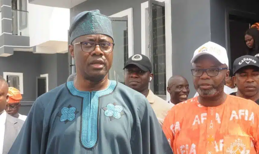 Abduljelyl Adekunle Karheem with Seyi Makinde