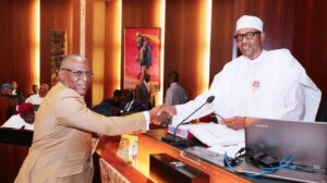 Olusegun Adekunle with Muhammadu Buhari