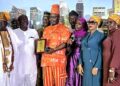 Afia Homes and Properties Chairman Mogaji Adanla receiving the Indigenous Real Estate Developer award.