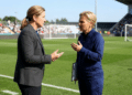 Jill Ellis and Sarina Wiegman discussing new FIFA coaching regulations on Female Coaches For All Women’s Teams