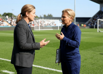 Jill Ellis and Sarina Wiegman discussing new FIFA coaching regulations on Female Coaches For All Women’s Teams