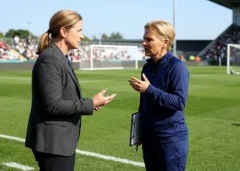 Jill Ellis and Sarina Wiegman discussing new FIFA coaching regulations on Female Coaches For All Women’s Teams