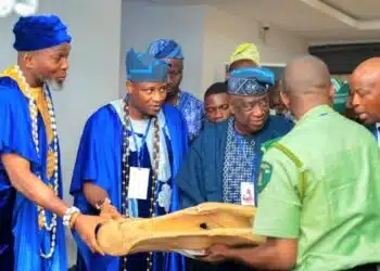 Minister Edmund Bartlett and Oguntoye twins at Ibadan Travel and Tourism Expo announcement.