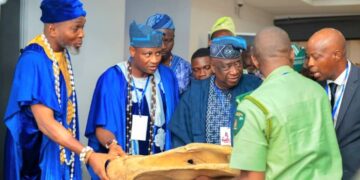 Minister Edmund Bartlett and Oguntoye twins at Ibadan Travel and Tourism Expo announcement.