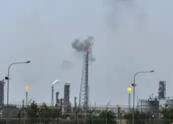Smoke rising from Mina al-Ahmadi oil refinery units following a drone strike in Kuwait