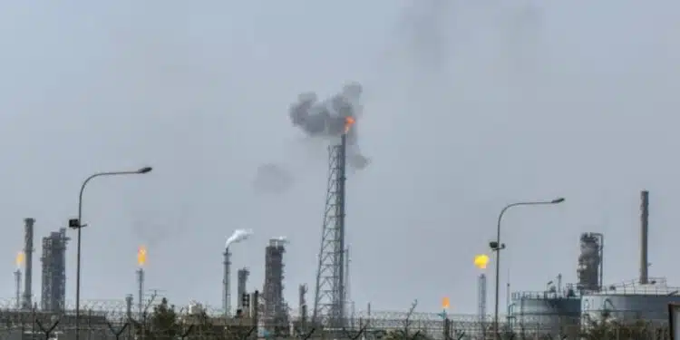 Smoke rising from Mina al-Ahmadi oil refinery units following a drone strike in Kuwait