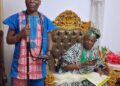 Wale Ojo-Lanre presenting Ekiti tourism landmarks to Olubadan Oba Rasidi Ladoja in Ibadan