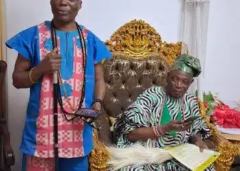 Wale Ojo-Lanre presenting Ekiti tourism landmarks to Olubadan Oba Rasidi Ladoja in Ibadan