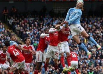 Erling Haaland celebrating his winning goal against Arsenal at the Etihad Stadium during the Premier League title race showdown.
