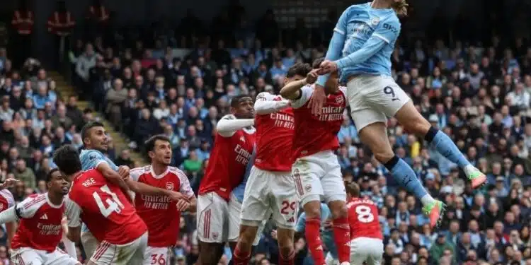 Erling Haaland celebrating his winning goal against Arsenal at the Etihad Stadium during the Premier League title race showdown.