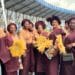 ​Members of the Ibadan Royal Women’s Club in burgundy and gold at the Ibadan Cultural Festival.
