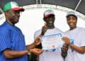 Governor Seyi Makinde speaking at the Allied Peoples Movement Oyo primary elections ahead of the Oyo State 2027 elections, with Bimbo Adekanmbi receiving his governorship certificate of return from APM party executives in Ibadan.