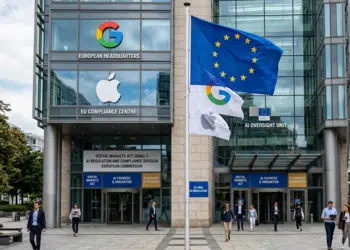European Union flag standing outside Google apple headquarters representing Digital Markets Act AI regulation.