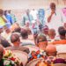 Oyo South senatorial candidate, Hon Adedeji Dhikrullahi Stanley Olajide, speaking at the Anfaani community town hall meeting in Ibadan.