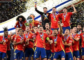 Spain national football team celebrating their 2026 FIFA World Cup winners trophy victory in New Jersey.