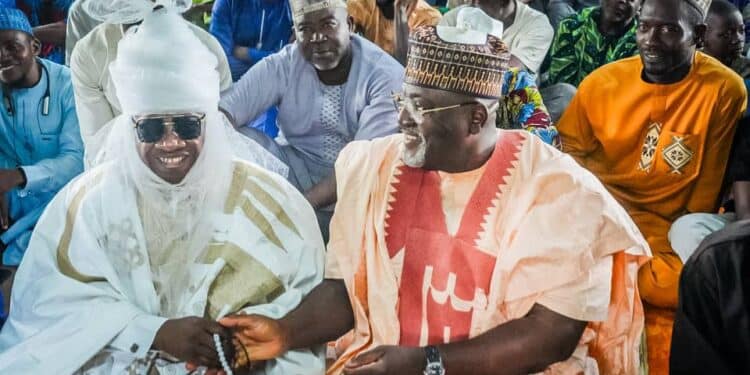 Hon. Adedeji Dhikrullahi Olajide Odidiomo presenting a contribution to Ago Ebira central mosque Ibadan leaders.
