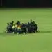 Nigeria's U-17 national football team lined up on the pitch ahead of their match against Ghana