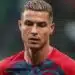 Cristiano Ronaldo in his Portugal national team jacket looking dramatically upward after leaving the training camp.