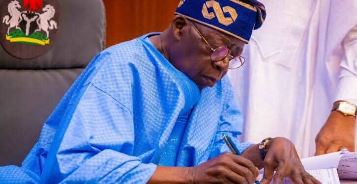 Bola Tinubu signing transport allowance for worker