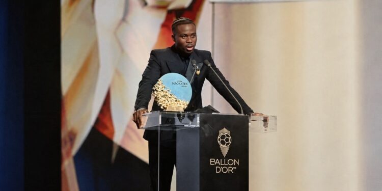 Bukayo Saka holds the Socrates Award at the 2026 Ballon d’Or ceremony in London.